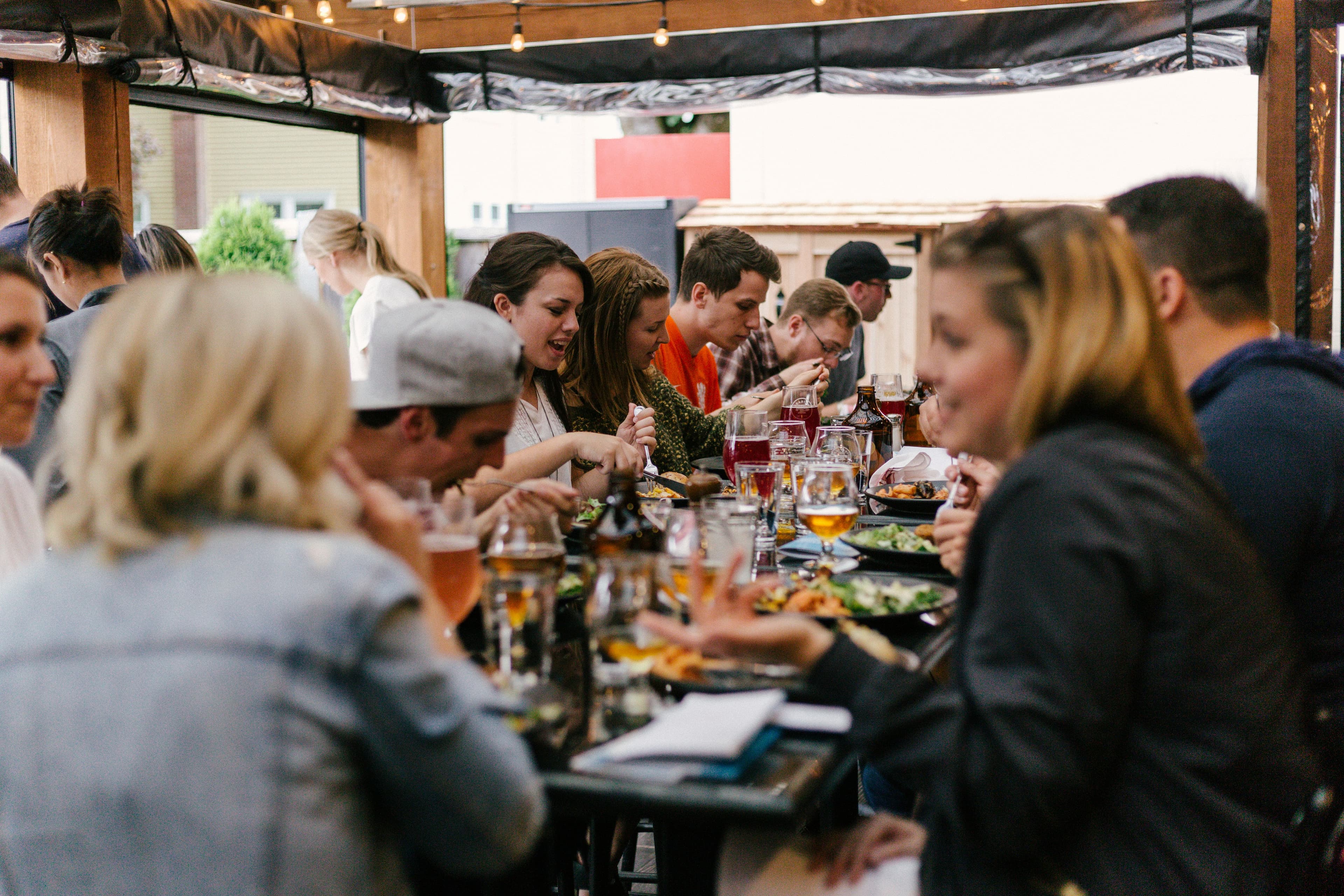 Connecting with friends during dinner.